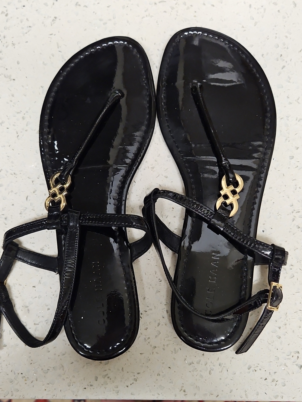 Black Patent T-Strap Sandals with Gold Accent